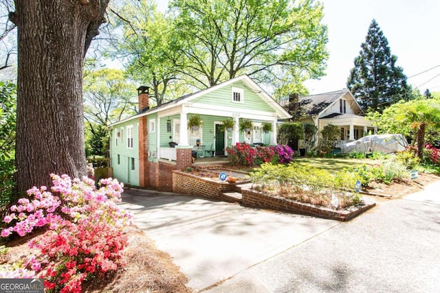 view of front of home featuring covered porch