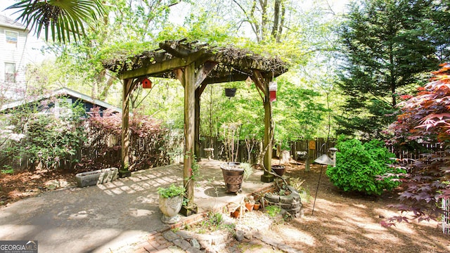 view of patio / terrace featuring a pergola