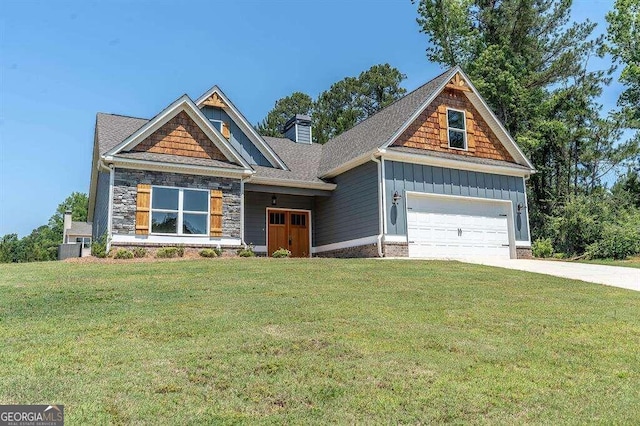 craftsman-style house with a front lawn and a garage