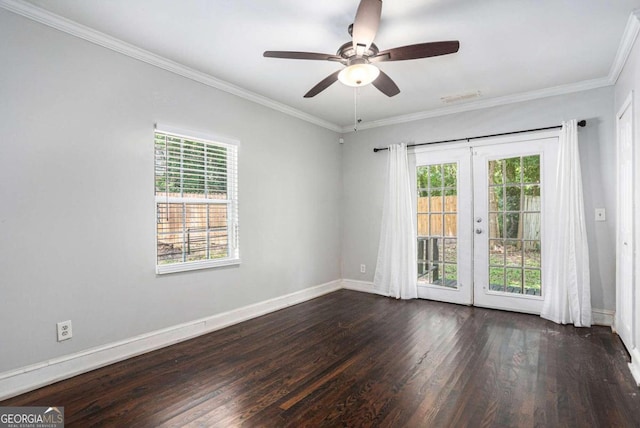 spare room with ceiling fan, wood-type flooring, french doors, and crown molding