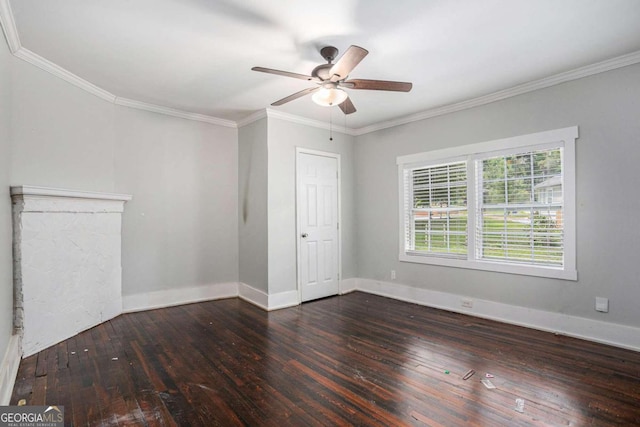 spare room with ceiling fan, hardwood / wood-style flooring, and crown molding