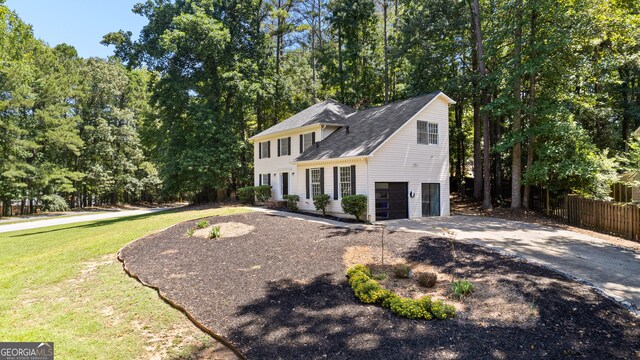 view of front of home with a garage