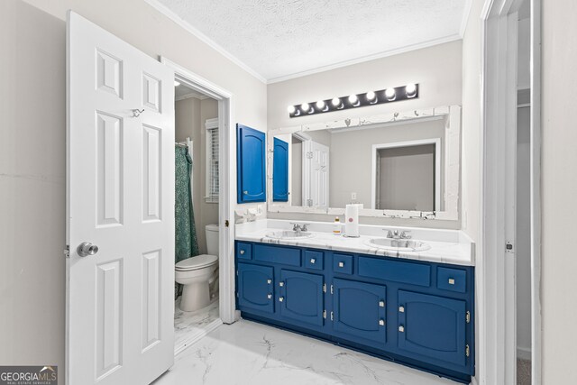 bathroom with toilet, vanity, ornamental molding, tile patterned floors, and a textured ceiling