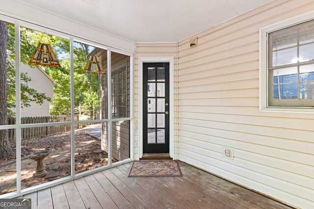 doorway to property featuring a deck