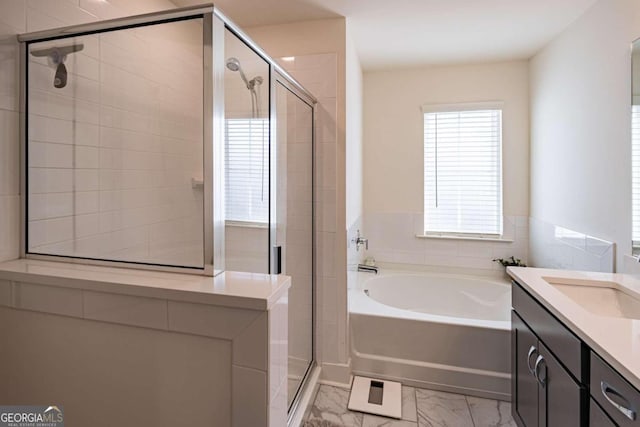 bathroom featuring vanity, plus walk in shower, and tile patterned flooring