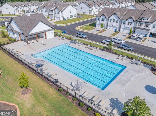 view of swimming pool with a patio area