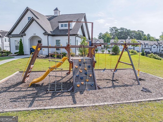 view of jungle gym with a lawn