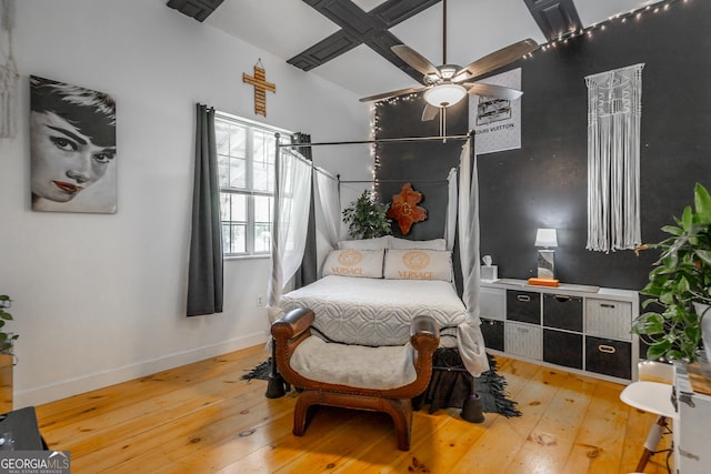 bedroom featuring light wood-type flooring and baseboards