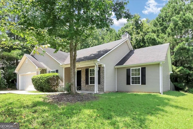 view of front of house with a front lawn and a garage