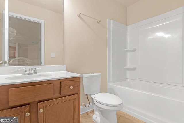 full bathroom with shower / bathtub combination, vanity, toilet, and tile patterned flooring