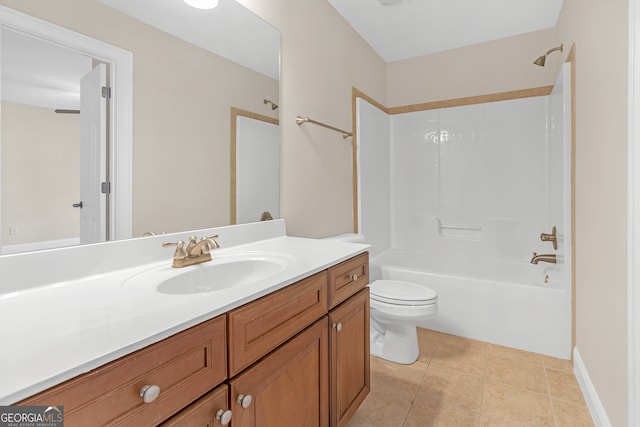 full bathroom with  shower combination, tile patterned floors, vanity, and toilet