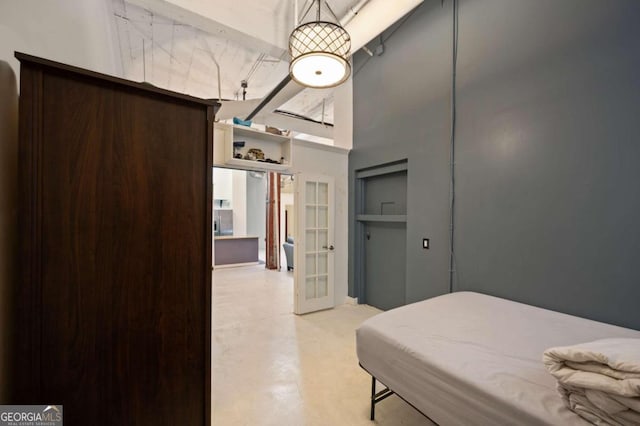 bedroom with a towering ceiling