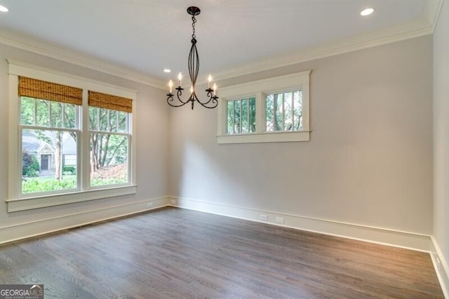 unfurnished room featuring hardwood / wood-style floors and a healthy amount of sunlight