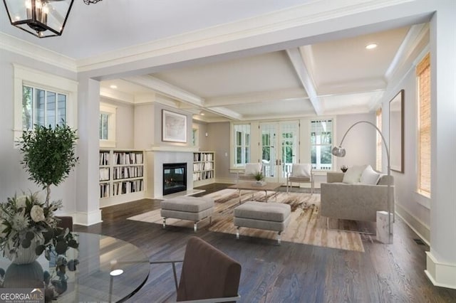 living room featuring ornamental molding, french doors, coffered ceiling, beamed ceiling, and dark wood-type flooring