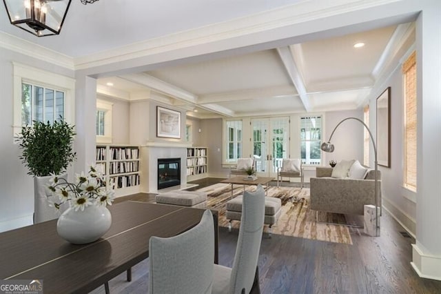 interior space featuring a wealth of natural light, french doors, dark hardwood / wood-style floors, and coffered ceiling