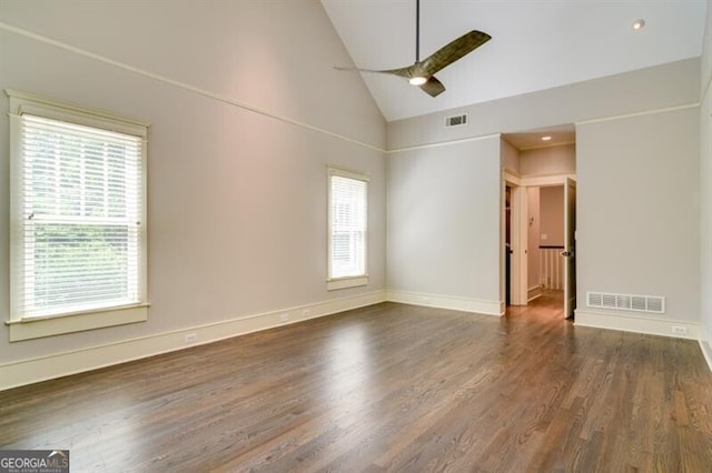 spare room featuring high vaulted ceiling, ceiling fan, and hardwood / wood-style flooring