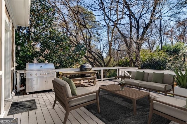 wooden deck featuring grilling area and an outdoor living space