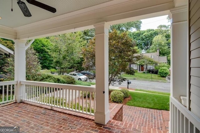 view of patio featuring ceiling fan