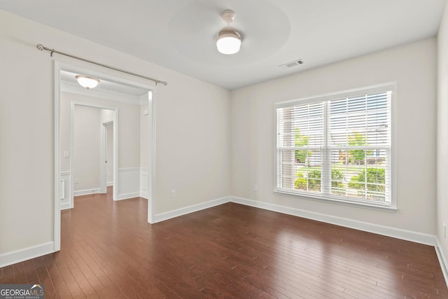 unfurnished room featuring dark hardwood / wood-style floors