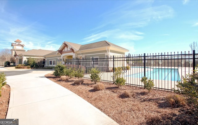 exterior space featuring a community pool