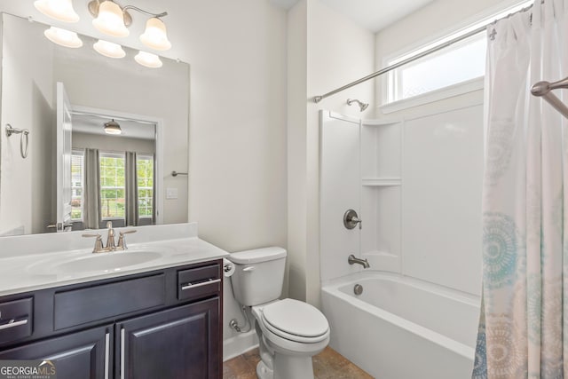 full bathroom featuring vanity, toilet, a wealth of natural light, and shower / bath combo with shower curtain