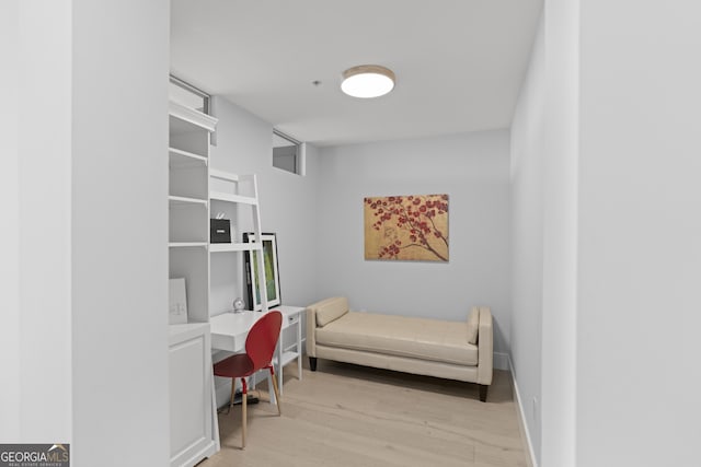 sitting room featuring light wood-type flooring