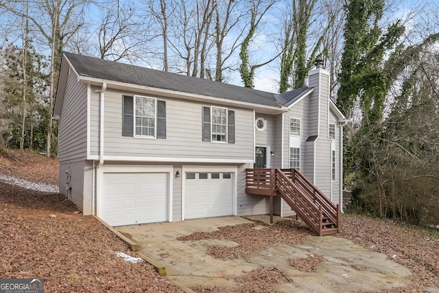 raised ranch featuring a garage