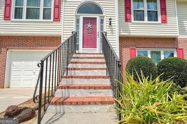 property entrance featuring a garage