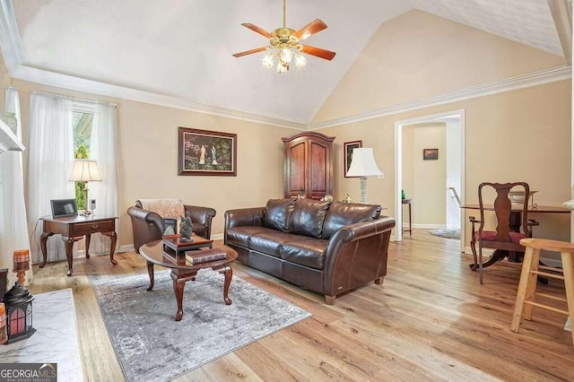 living room with ceiling fan, ornamental molding, light hardwood / wood-style floors, and high vaulted ceiling