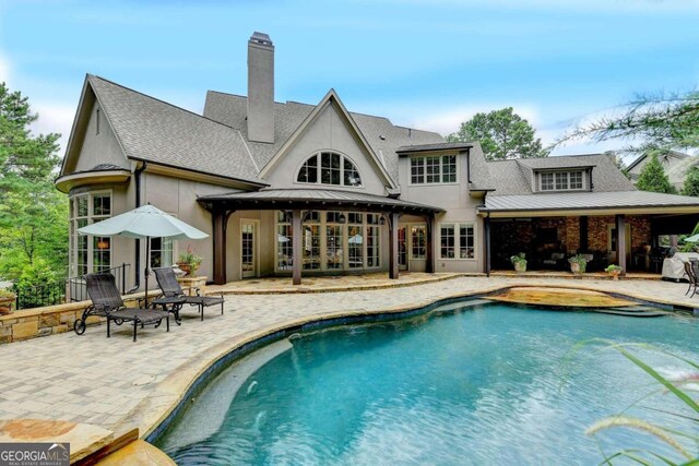 back of house featuring a patio area