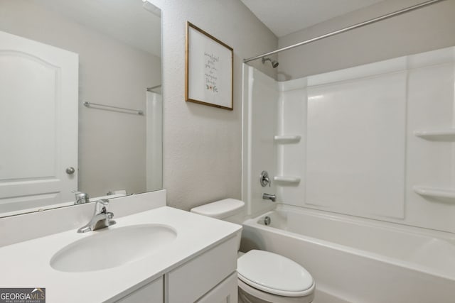 full bathroom with vanity, tub / shower combination, and toilet