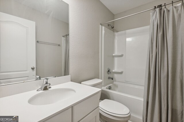 full bathroom featuring vanity, shower / tub combo, and toilet