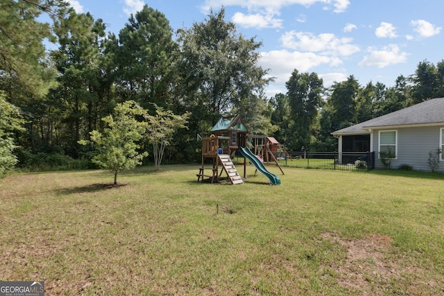 view of yard featuring a playground