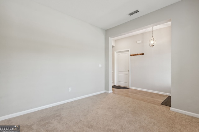 empty room with light wood-type flooring