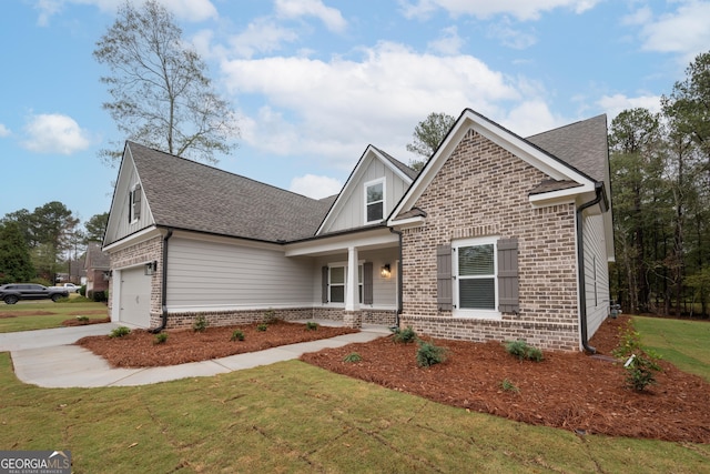 view of front facade with a front yard and a garage