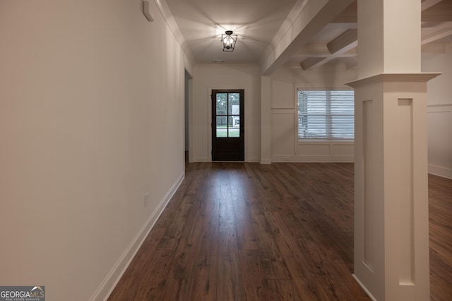 entrance foyer with beamed ceiling and dark wood-type flooring