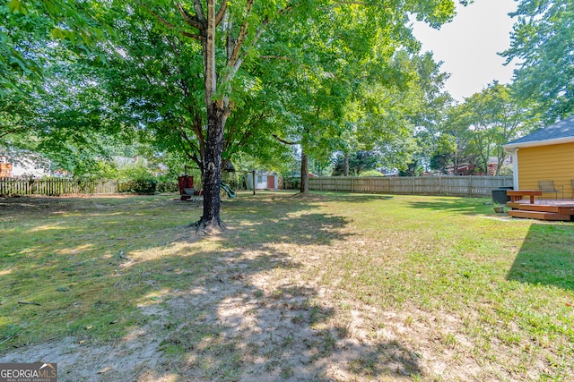 view of yard featuring a deck