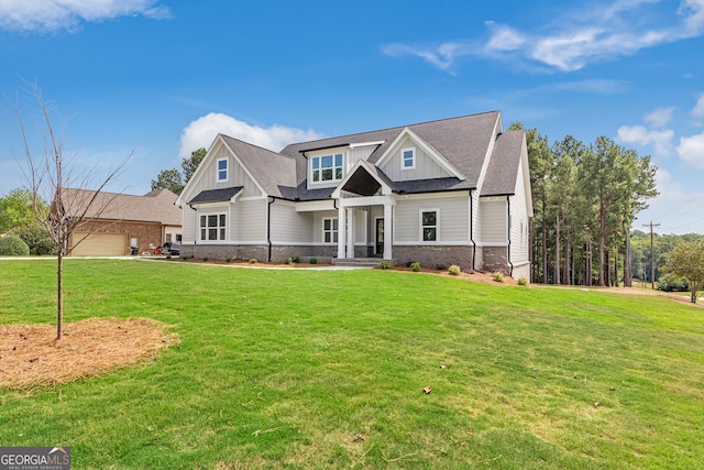 craftsman-style home with a front lawn