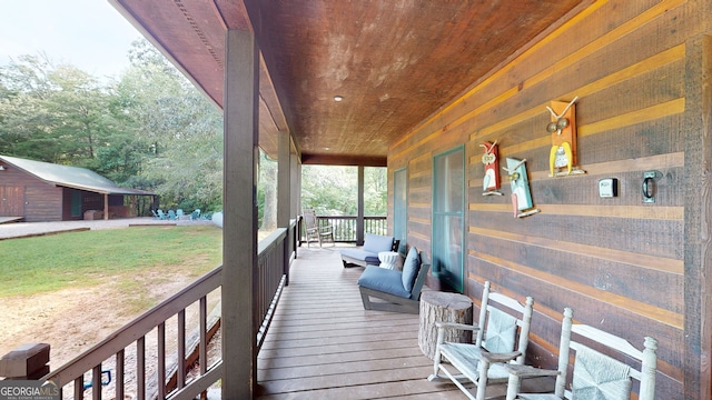 deck featuring an outdoor structure