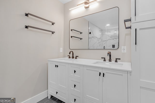 bathroom featuring vanity, walk in shower, and tile patterned flooring