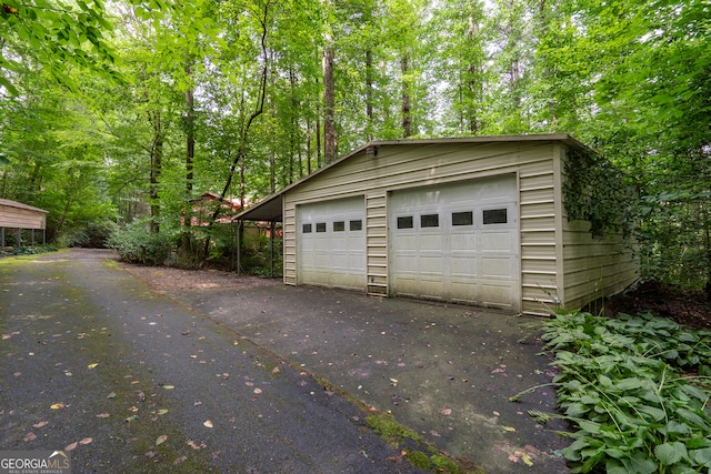 garage with a carport