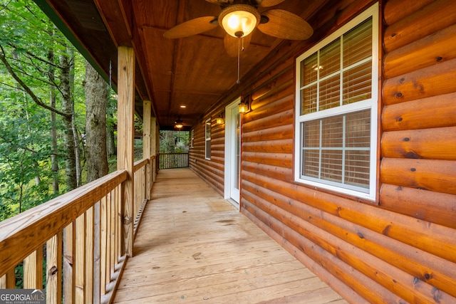 wooden terrace with ceiling fan