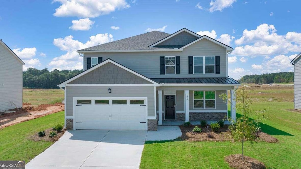 craftsman-style home featuring a porch and a front yard