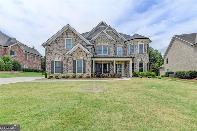 craftsman-style home with a front lawn