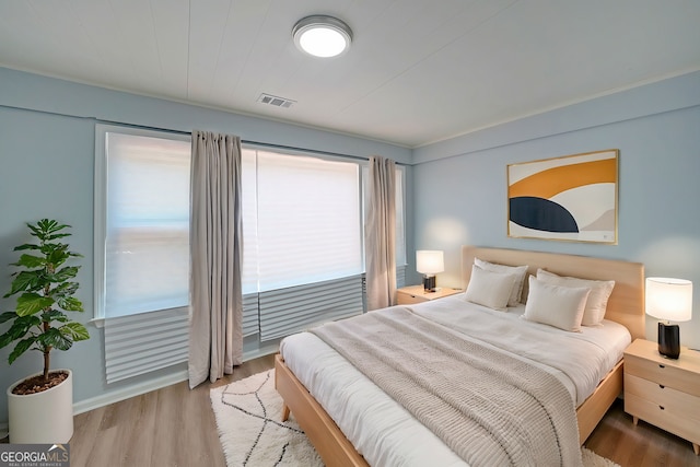 bedroom featuring light hardwood / wood-style flooring