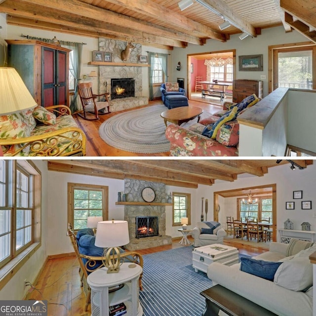 living room featuring a wealth of natural light, beam ceiling, and a stone fireplace