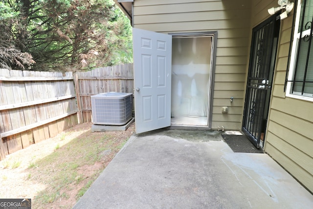 view of patio with central AC