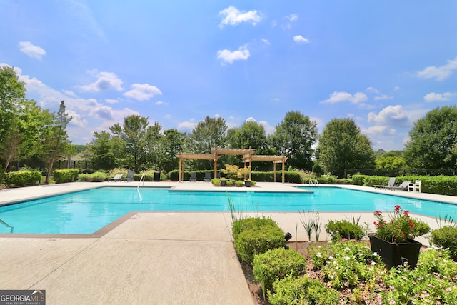 view of swimming pool with a pergola and a patio area