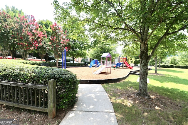 view of playground with a yard