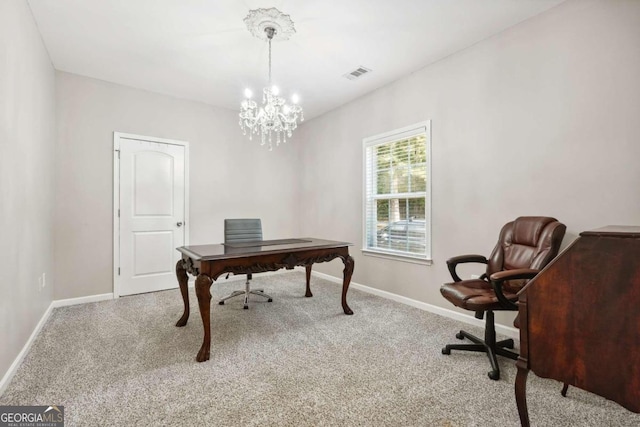 carpeted office featuring a chandelier